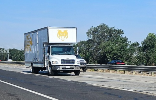 Professional All Cal Moving truck with an owner-operated team preparing for a long-distance move.